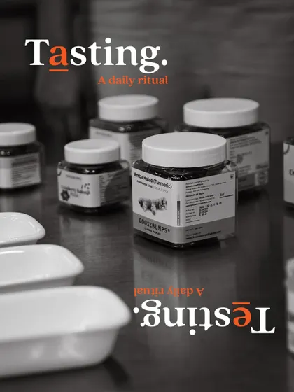 Jars lined up for our daily tasting ritual. This commitment to quality control is at the core of what we do.