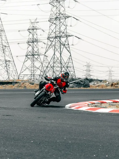 A rider cornering on a GT 650 at the CoASTT track.