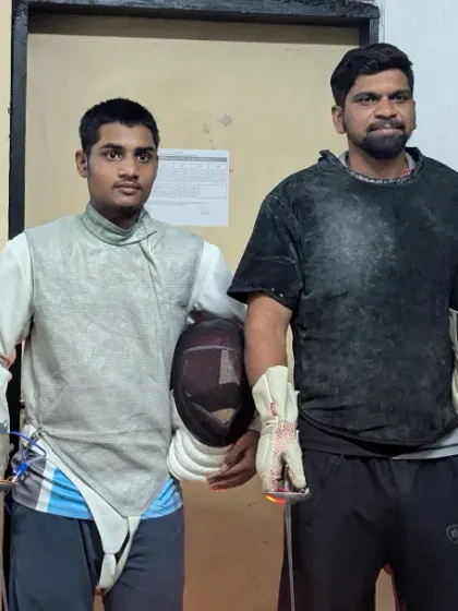 A close up of our Khelo India athletes with their coach. The determination in their eyes reflects the intense preparation they underwent for the competition.
