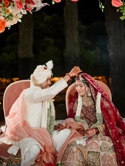 The groom applies the sindoor, sealing their bond. These are the sacred traditions that I frame with beautiful decor and heartfelt emotion.