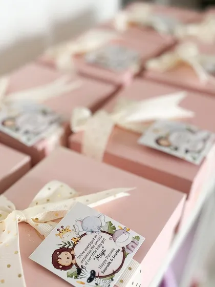 Little one on the way? We can customize these lovely pink boxes with special cards to make your baby girl announcement extra special.