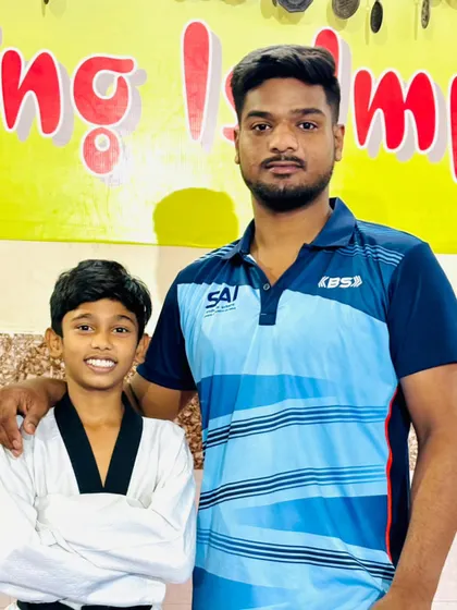 Another picture with my student. I am proud of the progress each of my tigers makes.
