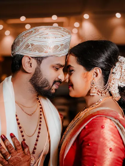 An intimate close-up of the couple, their faces touching, capturing a moment of pure love and connection.