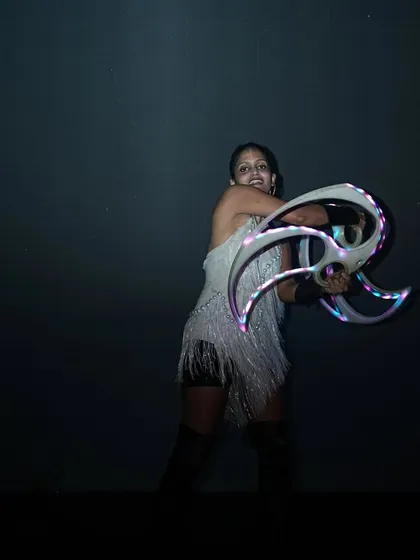 Another angle of the LED fan performance, showing how the lights can be programmed to create specific shapes and letters, like this 'R'.