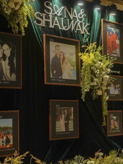 A 'story wall' is one of my favorite personal touches. For this sangeet, we created a timeline of the couple's 18-year journey on a rich emerald velvet backdrop, allowing guests to share in their beautiful love story.