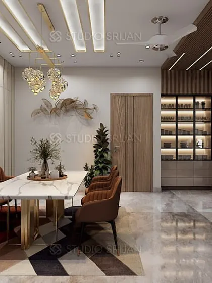 A beautiful dining space in Bali Nagar, with a modern chandelier and a custom-built cabinet, perfect for family meals and formal dinners.