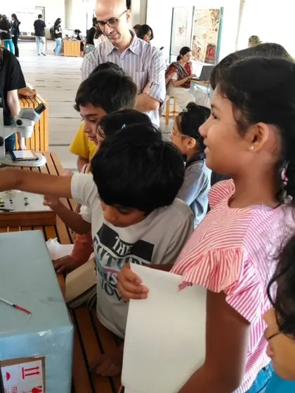 A collection of moments from our various hands-on science activities, showing children deeply engaged in learning through doing.