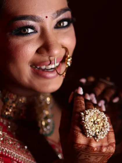 A joyful close-up that captures the essence of the day. The makeup is designed to be tear-proof and last through every emotional and happy moment.