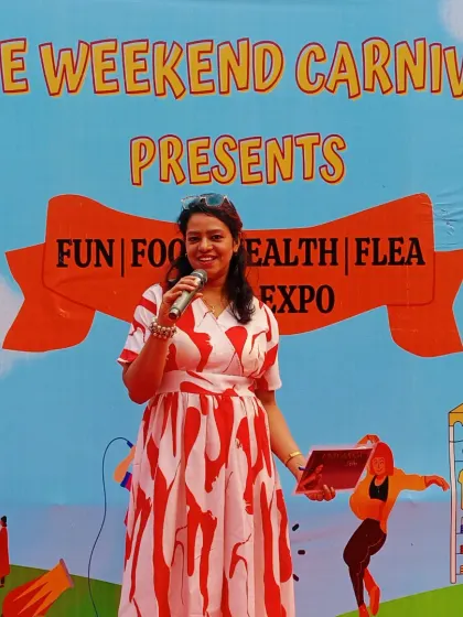 On stage at The Weekend Carnival, ready to engage the crowd. These brand expos are all about fun, food, and shopping, and I make sure the energy from the stage reflects that festive spirit.
