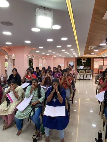 An important part of learning is observation. Here, students are practicing a breathing technique to steady their hands before starting delicate eye work.