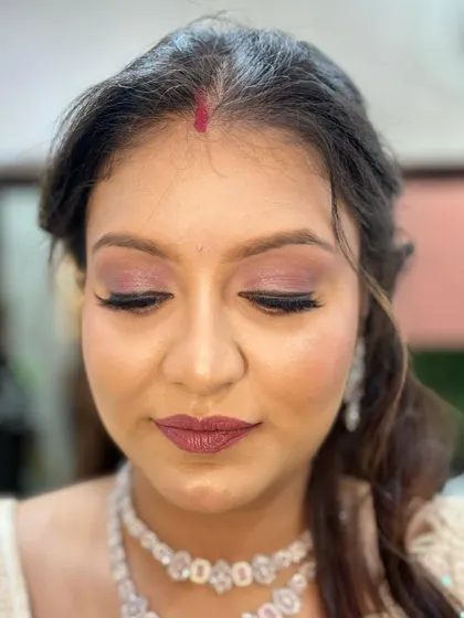 Another angle of the finished look, focusing on the beautifully blended eye makeup and the defined brows.