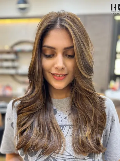 Your hair deserves to be the main event. We created this stunning, sun-kissed look with a custom balayage, blending colours seamlessly for a natural yet glamorous effect that’s perfect for a modern bride.