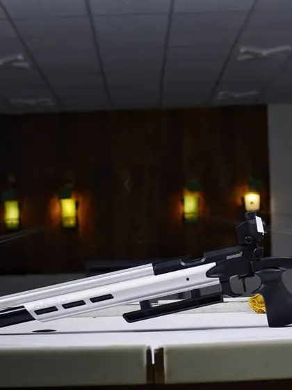 A close-up of a modern Hammerli competition air rifle, highlighting the professional-grade equipment available for use at my academy.