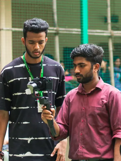 Here I am learning from a fellow creator during a college fest. I believe in constantly learning and collaborating with other artists in the field.