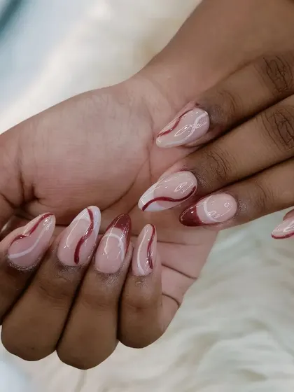 A full view of the minimalist and artistic red and white swirl design.