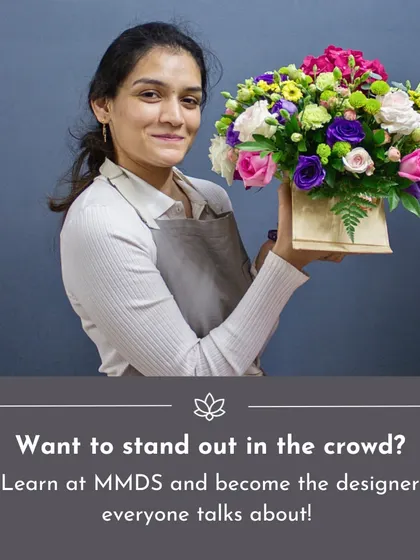 Want to be the designer everyone talks about? This student, holding her professional-quality arrangement, embodies the skill and artistry I teach in my career-focused courses.