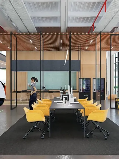 A dynamic work area within the 'ePositive' campus, designed for versatility and play. The open space, defined by transparent partitions and minimalist furniture, encourages movement and creative thinking, proving that a functional workspace can also be inspiring.