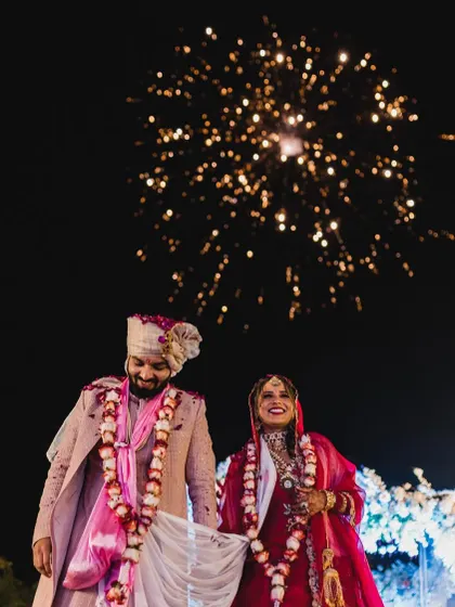 A magical moment from my own wedding. This picture captures the joy and the fireworks, a perfect memory.