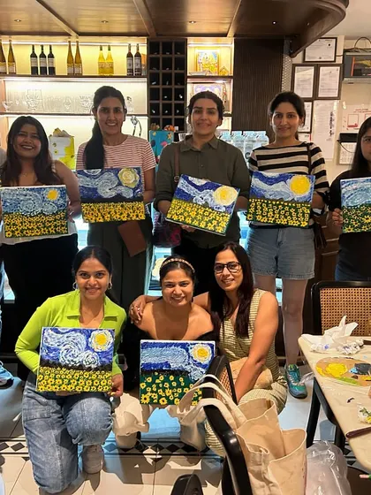 Another wonderful group shot from our 'Starry Night' knife painting workshop, with every artist showing off their work.