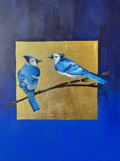 A commissioned painting of two blue jays on a branch, set against a square of shimmering gold leaf. The contrast between the detailed birds and the modern, graphic background creates a striking visual.