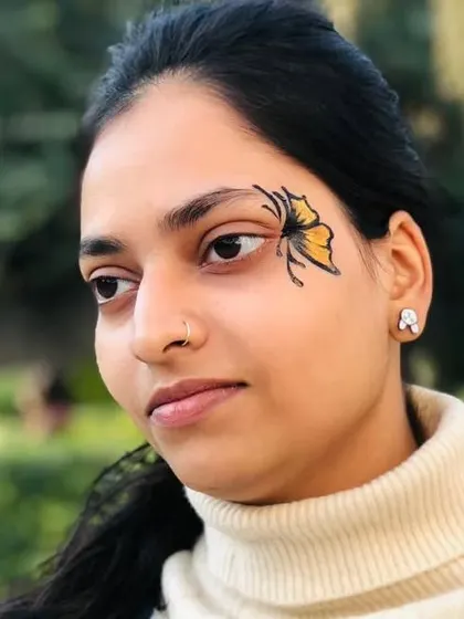 A monarch butterfly design with detailed black linework and orange coloring.