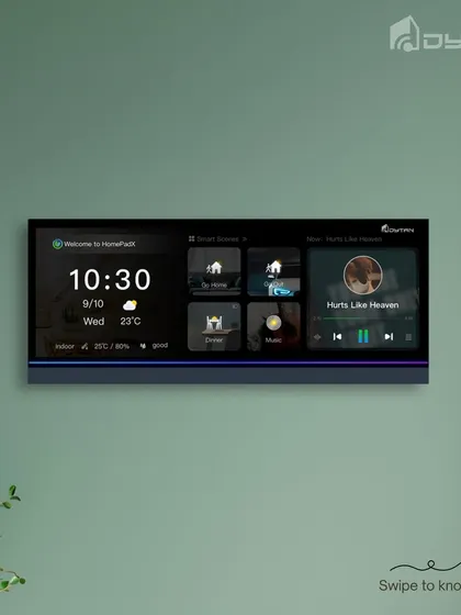 A clean shot of the HomePad mounted on a green wall, demonstrating its ability to complement interior design choices while offering powerful functionality.