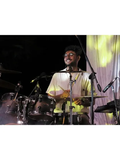 Our drummer enjoying the vibe at the Gangavathi wedding. A smiling musician means a happy crowd!