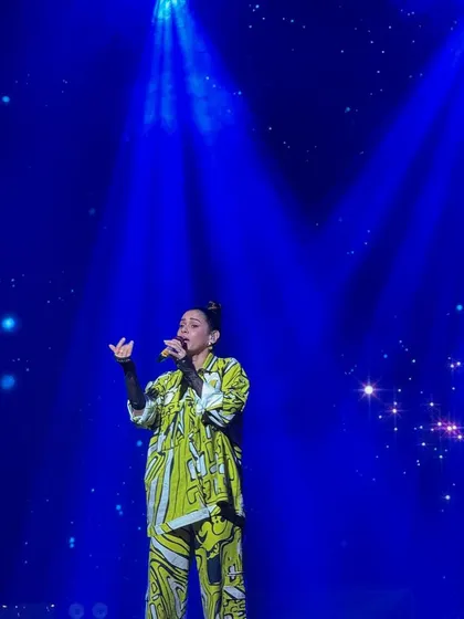 A star-lit stage for a star performer. The combination of a galaxy-like background and powerful spotlights created a magical setting for this Sangeet performance.