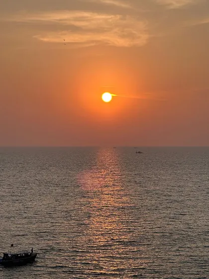 It's not all mountains. We also chase sunsets over the ocean. Imagine ending your day with this breathtaking view on our Gokarna beach trip. Salty air, golden skies, and good company.