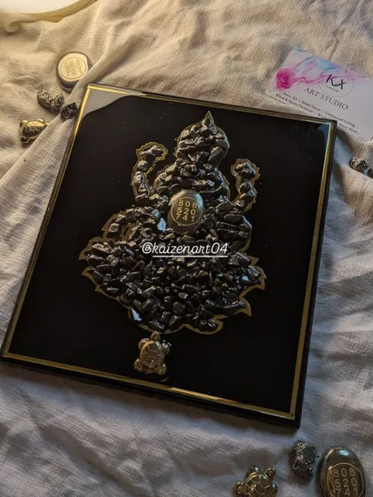 The Lakshmi Ji artwork, filled with pyrite stones, is a perfect piece for your office, home, or as a housewarming gift to wish someone wealth and prosperity.