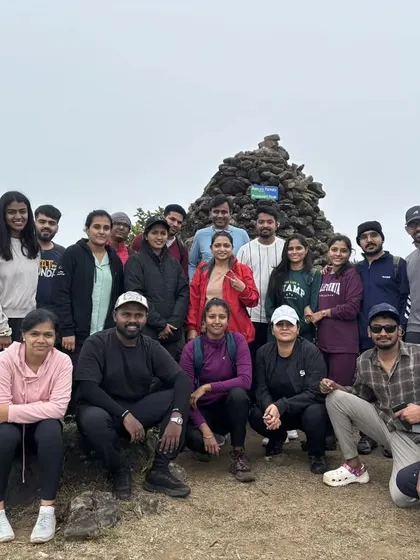A large group photo at the Kumaraparvatha peak, showing the diverse mix of people who join my treks.