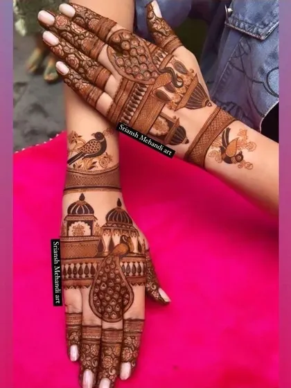 A mix of traditional motifs like birds and peacocks makes for a lovely festive design. This style is less dense than full bridal but still intricate and beautiful.