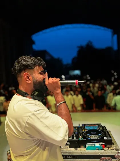 Hyping the crowd on the microphone at the Zenitra fest. Clear communication and crowd engagement are key parts of my performance.
