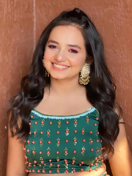 Another shot of the bridesmaid, her hair looking fresh and fun.