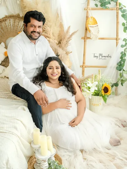 A full-length portrait capturing the couple in a beautifully styled, light-filled setting, creating a memory that is both serene and joyful.