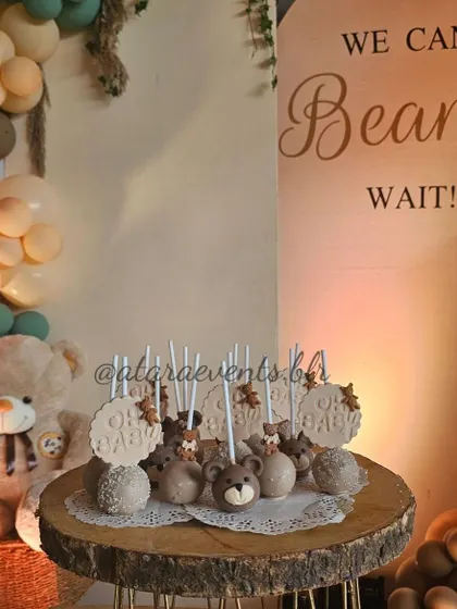 Adorable bear-themed cake pops and macarons for a "We Can Bearly Wait" baby shower. These detailed treats are almost too cute to eat!