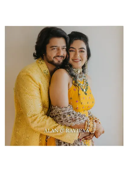 A sweet and happy portrait of the couple embracing during their Haldi ceremony. Their genuine smiles and the warm, natural light make this a perfect candid moment.