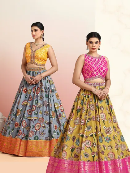 Two stunning floral lehengas side-by-side, one in mustard and pink, the other in grey and yellow, showcasing the versatility of our designs.
