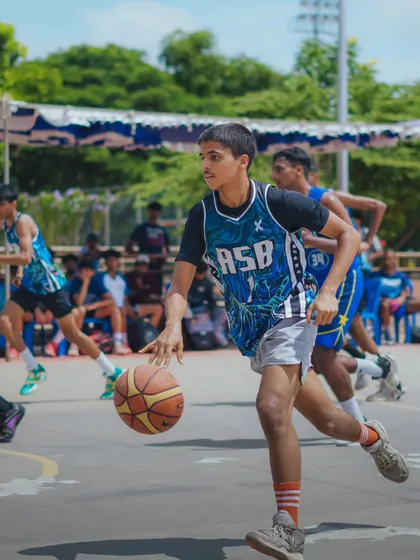 Dribbling down the court on a fast break in the BBL. Speed and ball handling are critical in the open court.