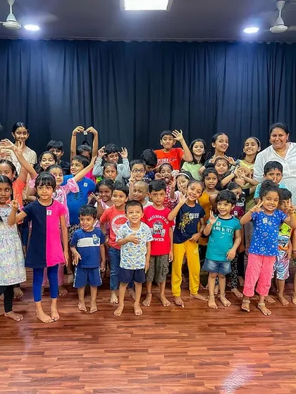 A happy group photo after a fun puppet show at a summer camp. These are the moments and smiles I cherish.