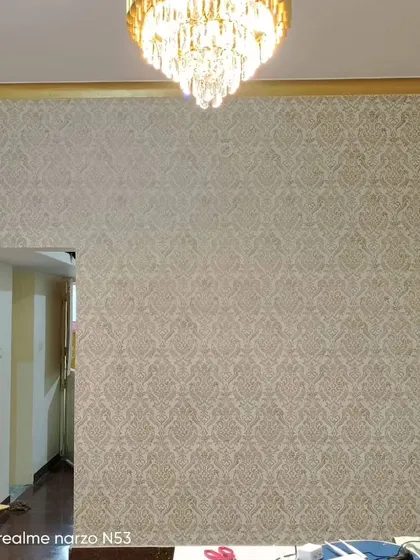 Another view of the elegant gold and beige damask wallpaper.