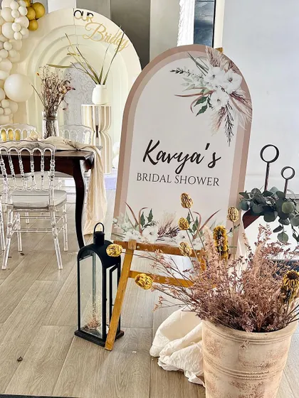 For this boho-themed bridal shower, we focused on natural textures and a neutral color palette. The setup included a custom welcome sign, dried flowers, and pampas grass to create a chic and relaxed atmosphere for the celebration.