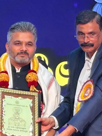 A closer look at the felicitation during the Siddharameshwara Jayanti event. I am humbled to be recognized in the presence of so many esteemed leaders and devotees.