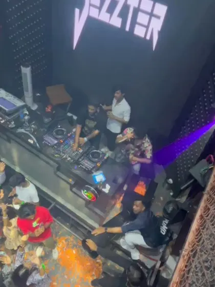 An overhead view of the DJ booth and the dance floor. This perspective shows the scale of the party and how I command the room from the decks.