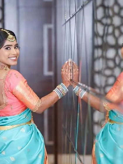 A fun and creative shot of the bride-to-be. Her braided hairstyle and soft makeup are perfect for an engagement party.