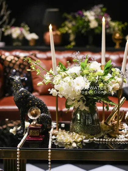 The unique centerpiece captures a mood of playful opulence, perfect for a glamorous Sangeet night.