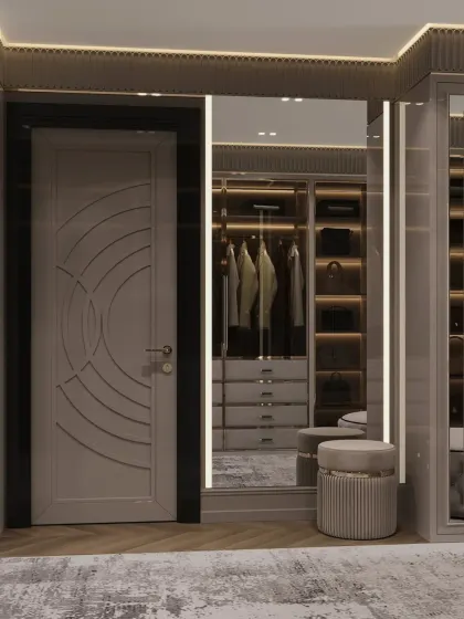 The entrance to the closet features a custom-designed door and a full-length mirror, creating a grand sense of arrival.