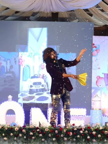 A magical moment with a flurry of confetti during a birthday performance.