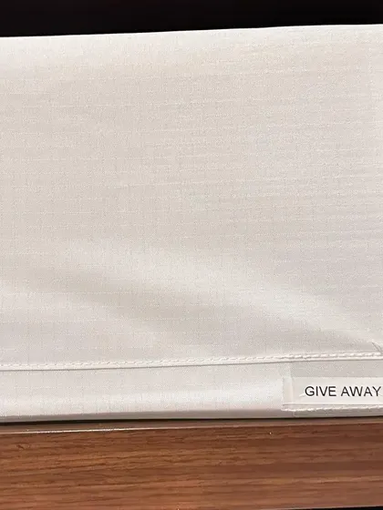 We always recommend a "Give Away" bin inside the closet. When you find something you no longer want, put it here immediately to keep your main wardrobe clutter-free.