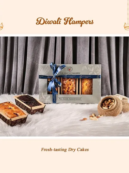 A closer look at our tea cake assortment hamper. It's a simple, elegant, and delicious gift for anyone who enjoys a sweet treat with their tea or coffee.